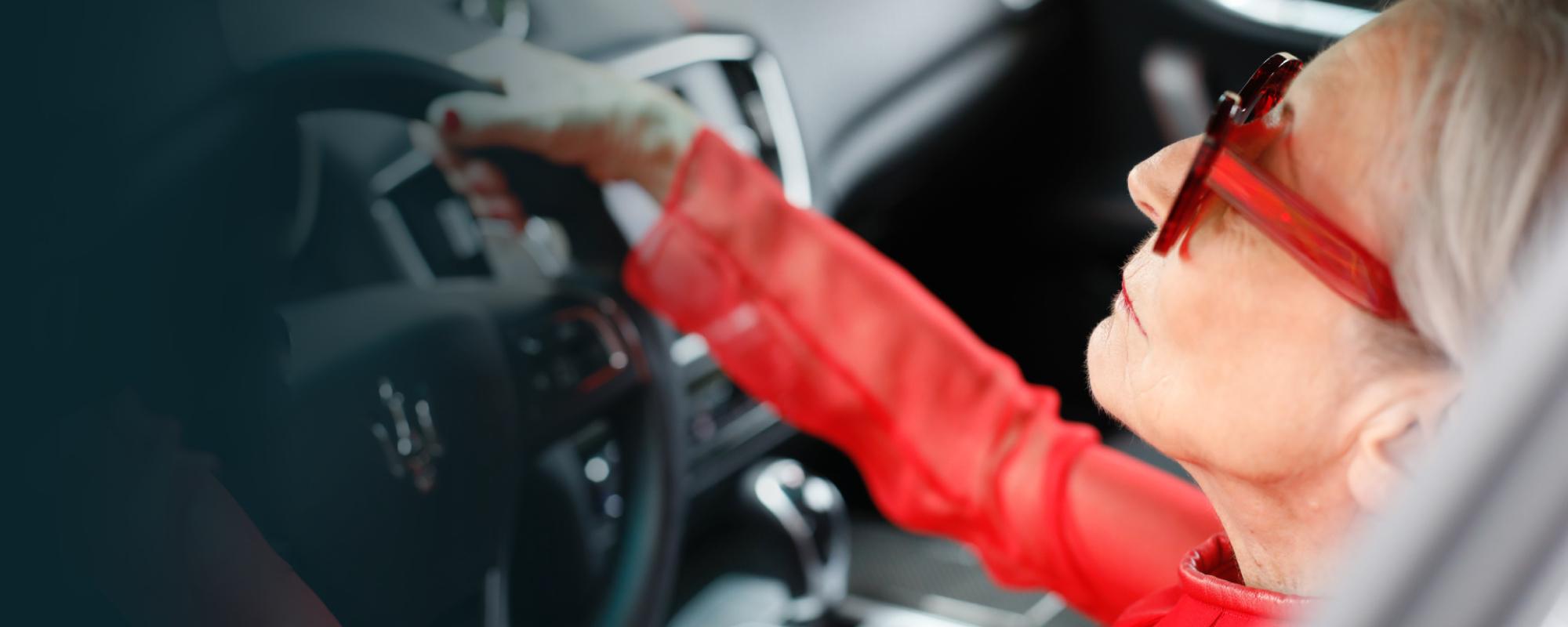 Hero-woman-driving-red-jacket